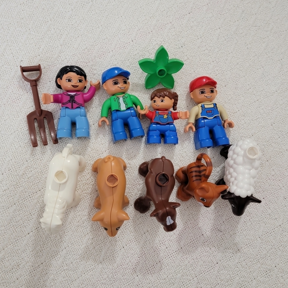 Lego Farmers set with 10 figures, including a farmer, farmer's wife, and 2 kids,